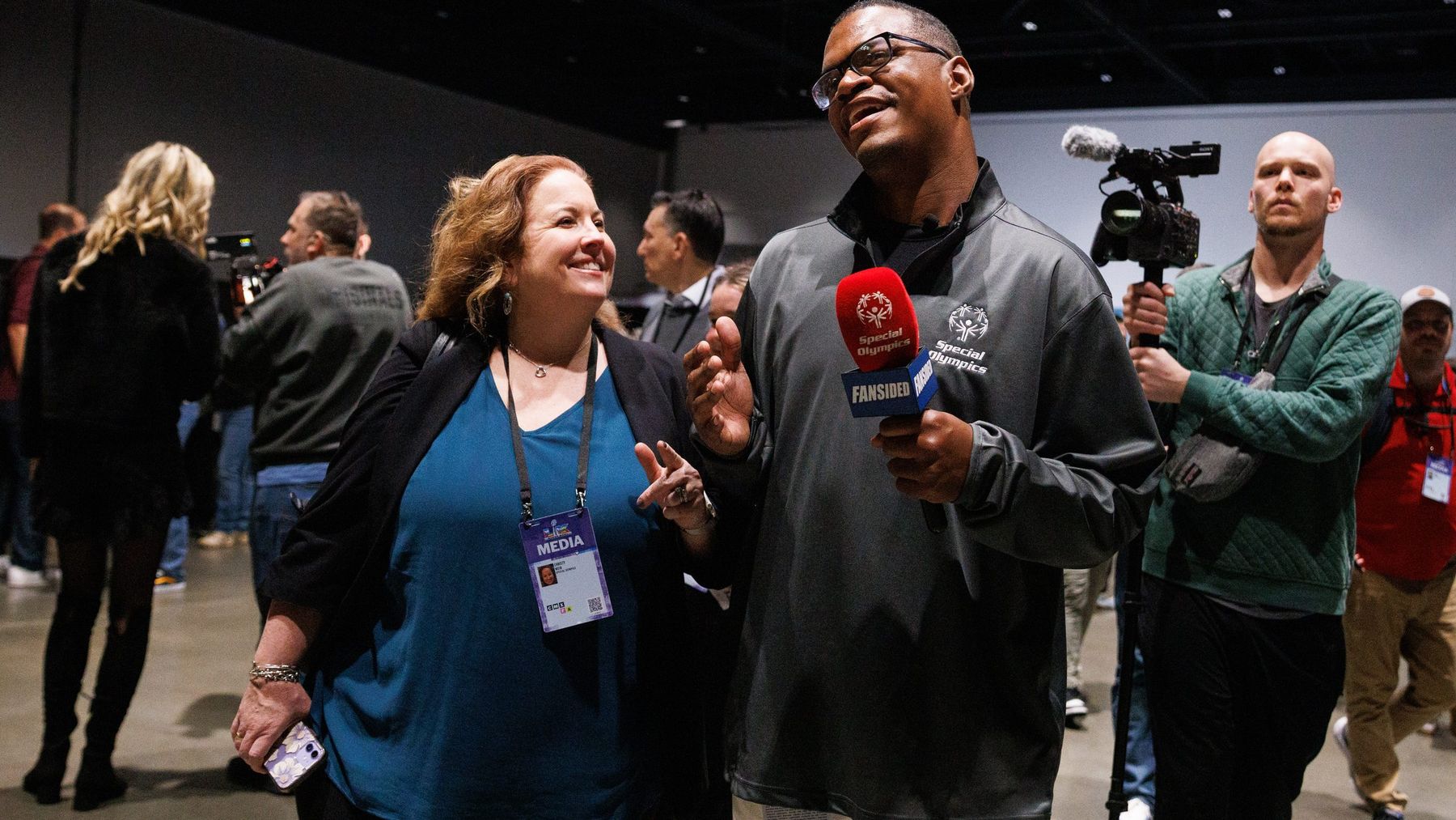 Malcom Harris-Gowdie and Christy Weir on Super Bowl media row